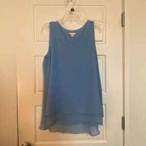Medium flowy layered light blue sleeveless blouse